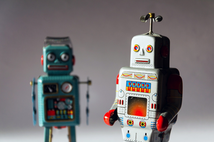 Angry vintage tin toy robots, artificial intelligence
