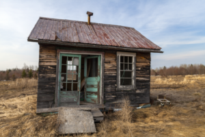 small broken down cabin or shack
